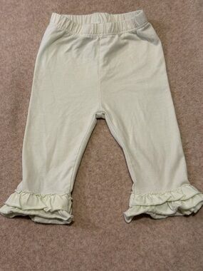 First Impressions Baby Ruffle Hem Leggings in Light Yellow